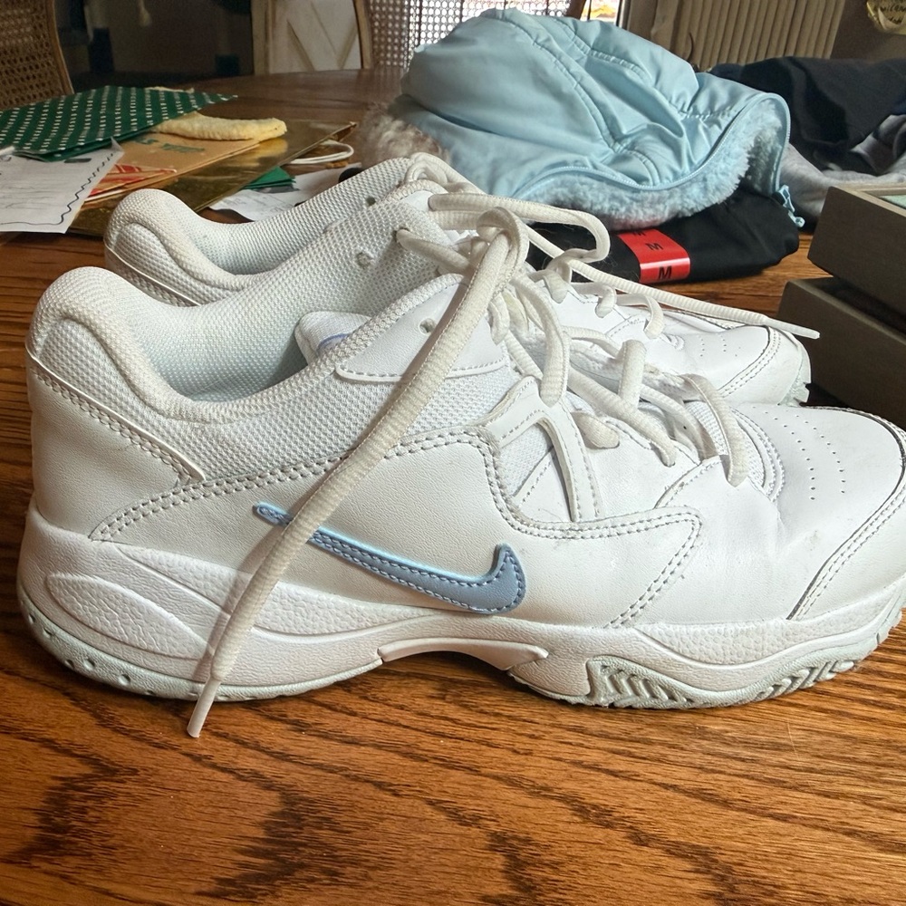 White Nikes with Blue Swoosh